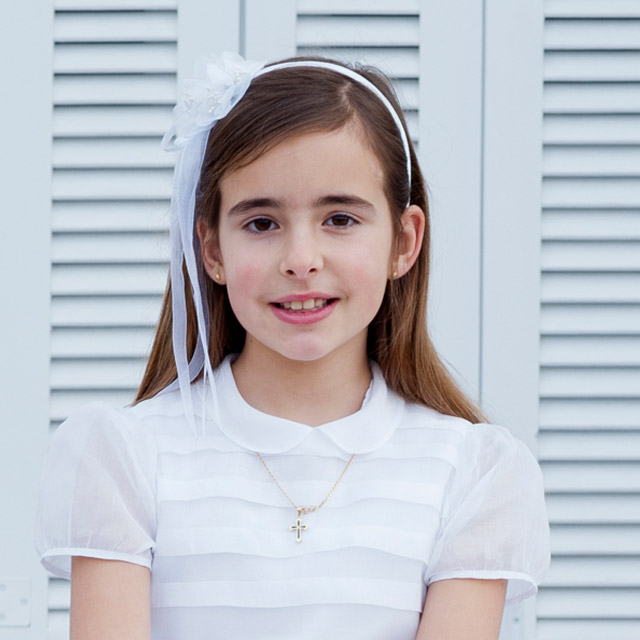 El día de su Primera Comunión